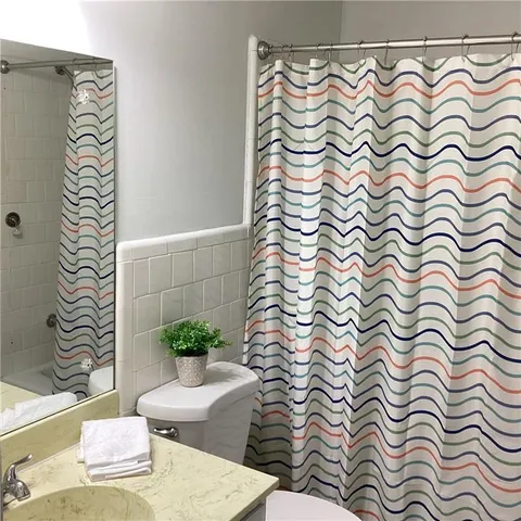 a view of a parking space with wooden fence