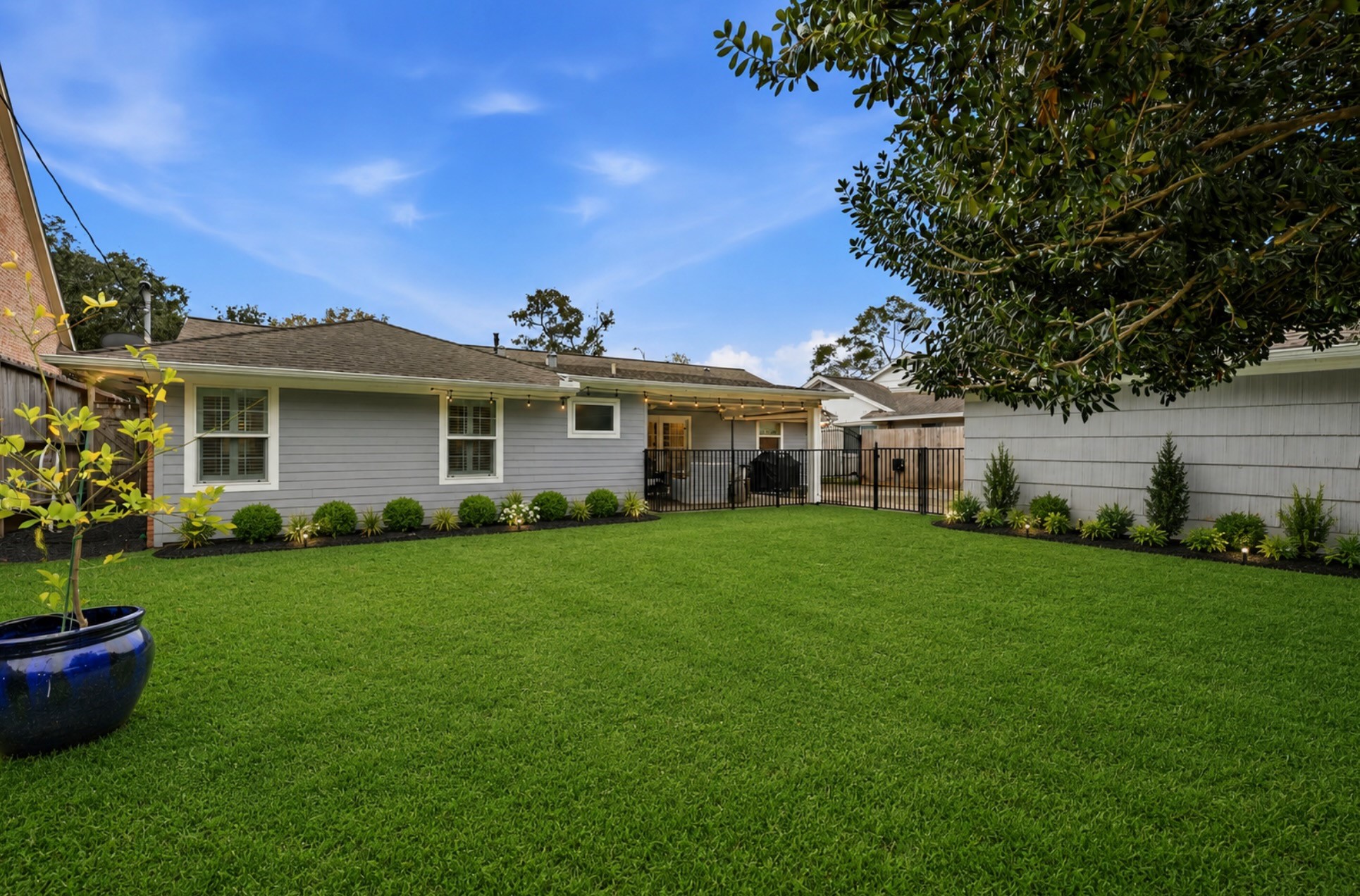 6236 Locke Lane Houston, TX 77057 - Photo 28 of 35 Here's a virtual rendering of the spacious backyard without the pool and with light landscaping added along the side of the house and garage. Tons of room for play! (Virtual rendering)