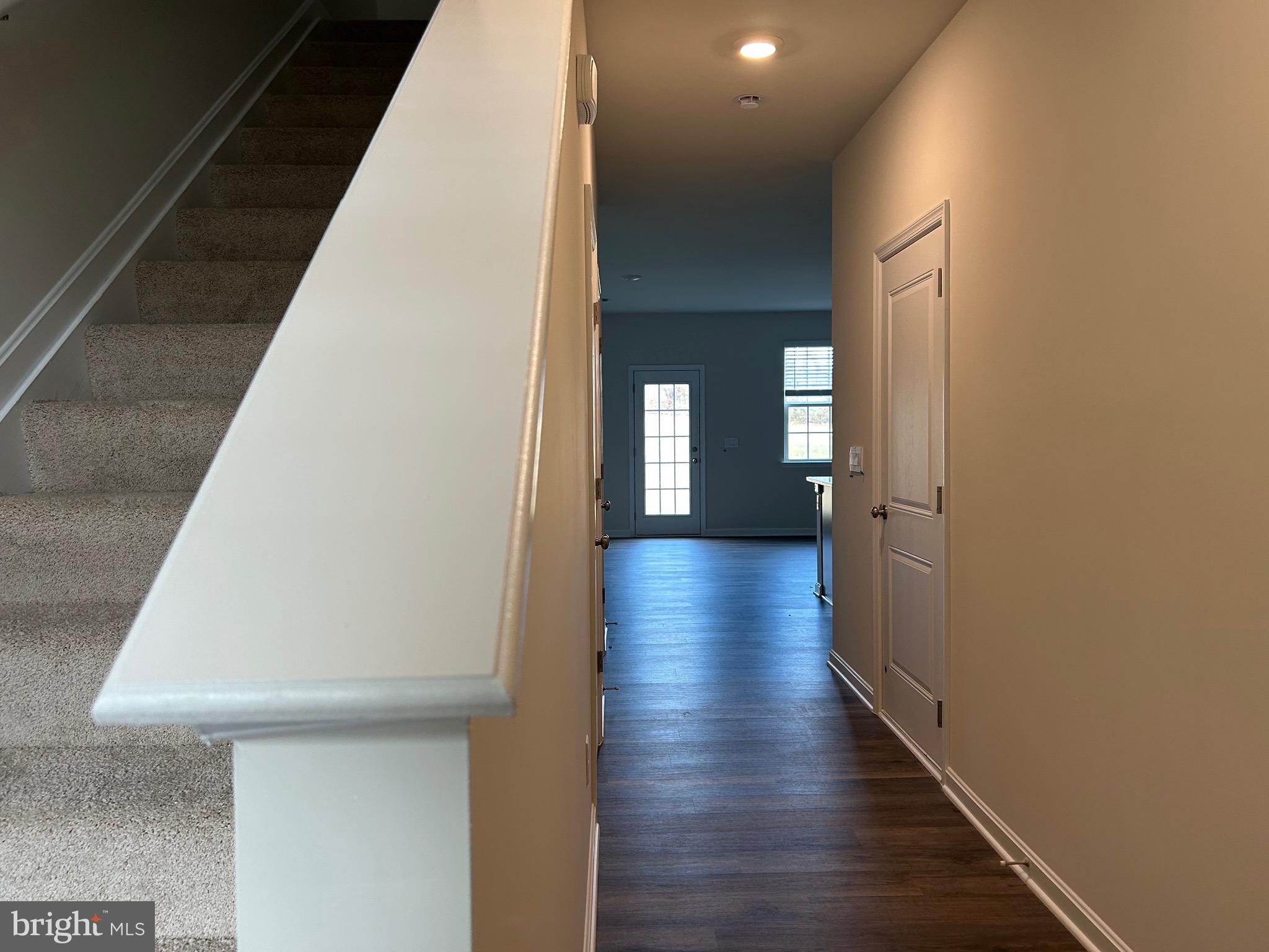 167 Rae Court Luray, VA 22835 - Photo 3 of 27 a view of a hallway with wooden floor and staircase