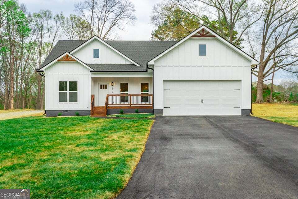 282 Glade Road Rossville, GA 30741 - Photo 1 of 20 a view of a yard in front view of a house