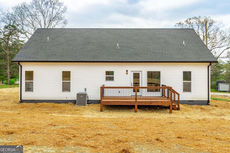 282 Glade Road Rossville, GA 30741 - Photo 3 of 20 a backyard of a house with yard and seating space