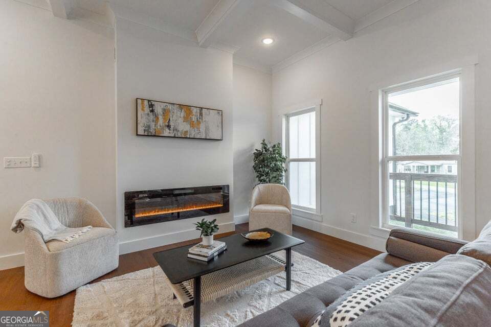 282 Glade Road Rossville, GA 30741 - Photo 6 of 20 a living room with furniture a rug and a window