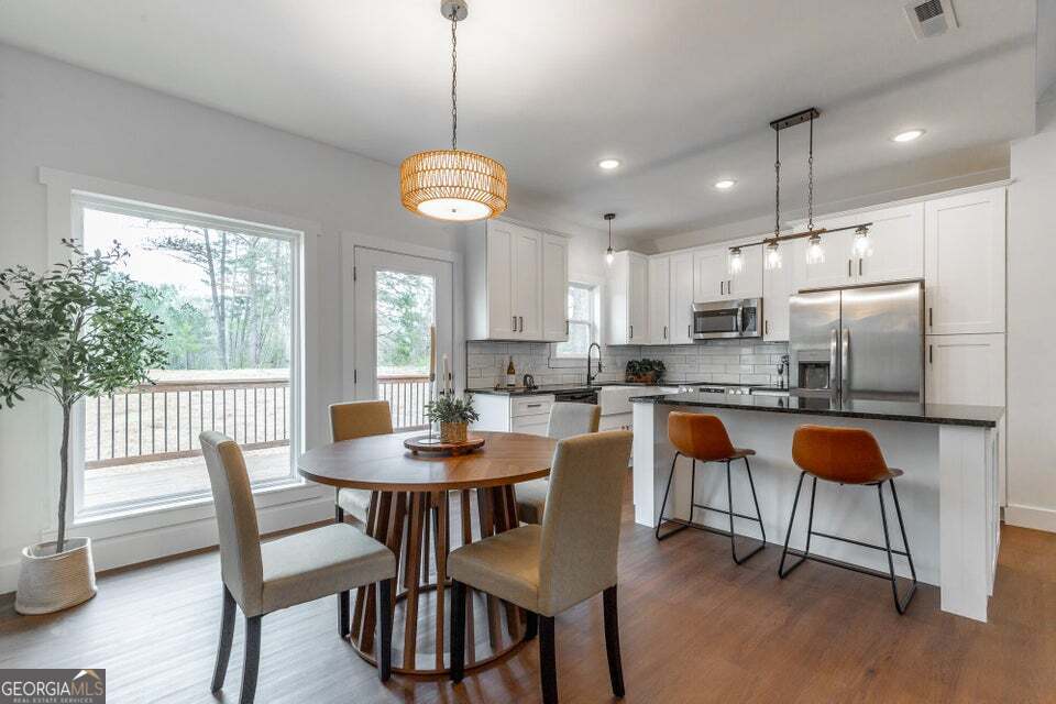 282 Glade Road Rossville, GA 30741 - Photo 7 of 20 a view of a dining room and livingroom view