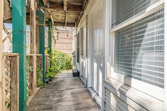a view of a bathroom with a glass door