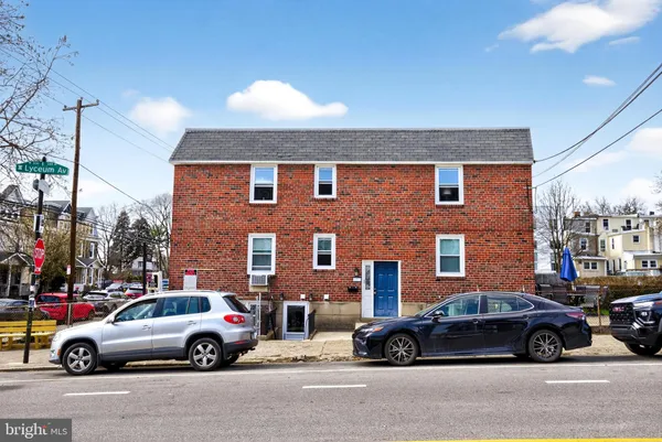 a car parked in front of a house