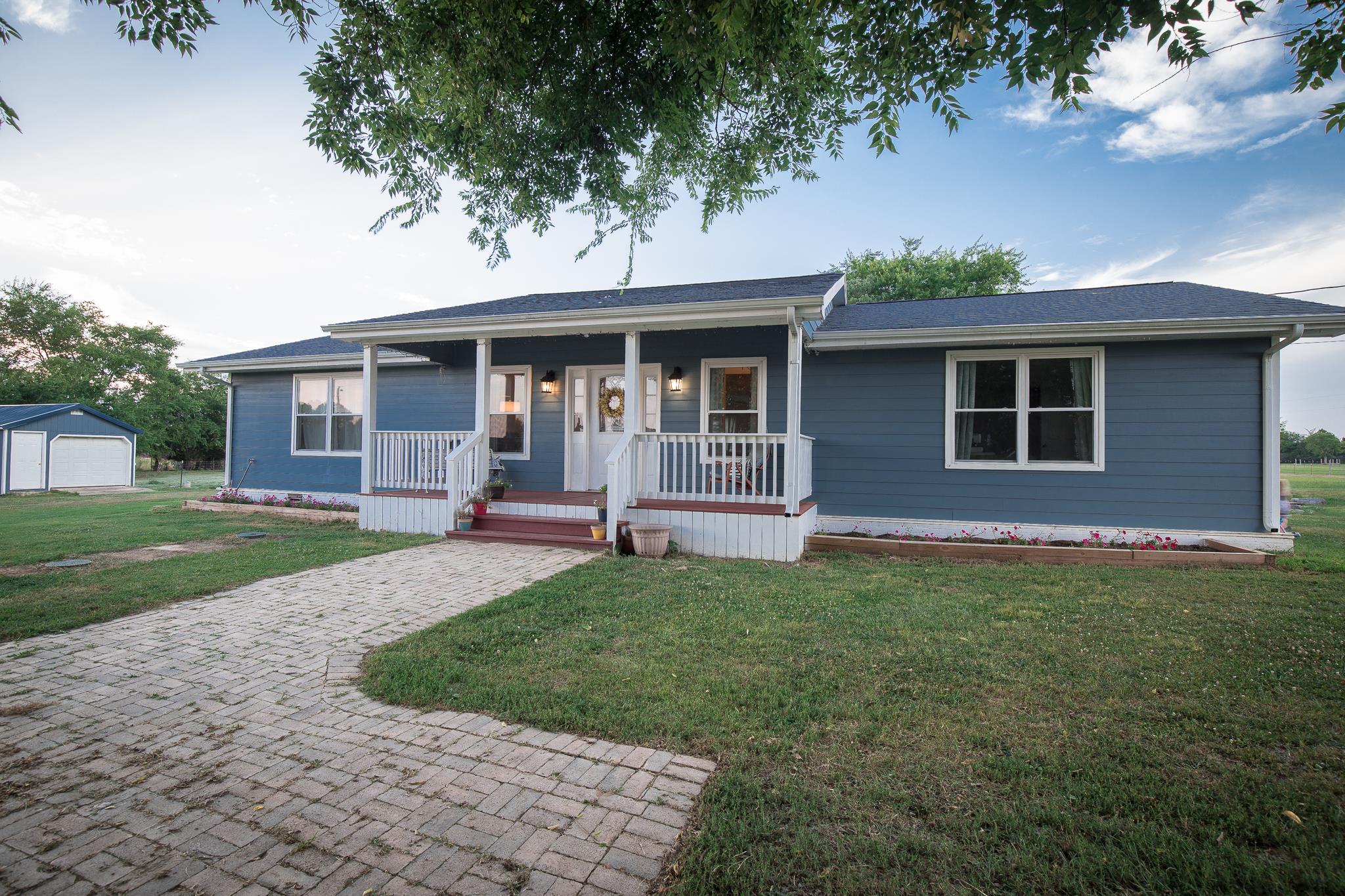 420 Squire Hall Road Bell Buckle, TN 37020 - Photo 1 of 23 a front view of a house with a yard