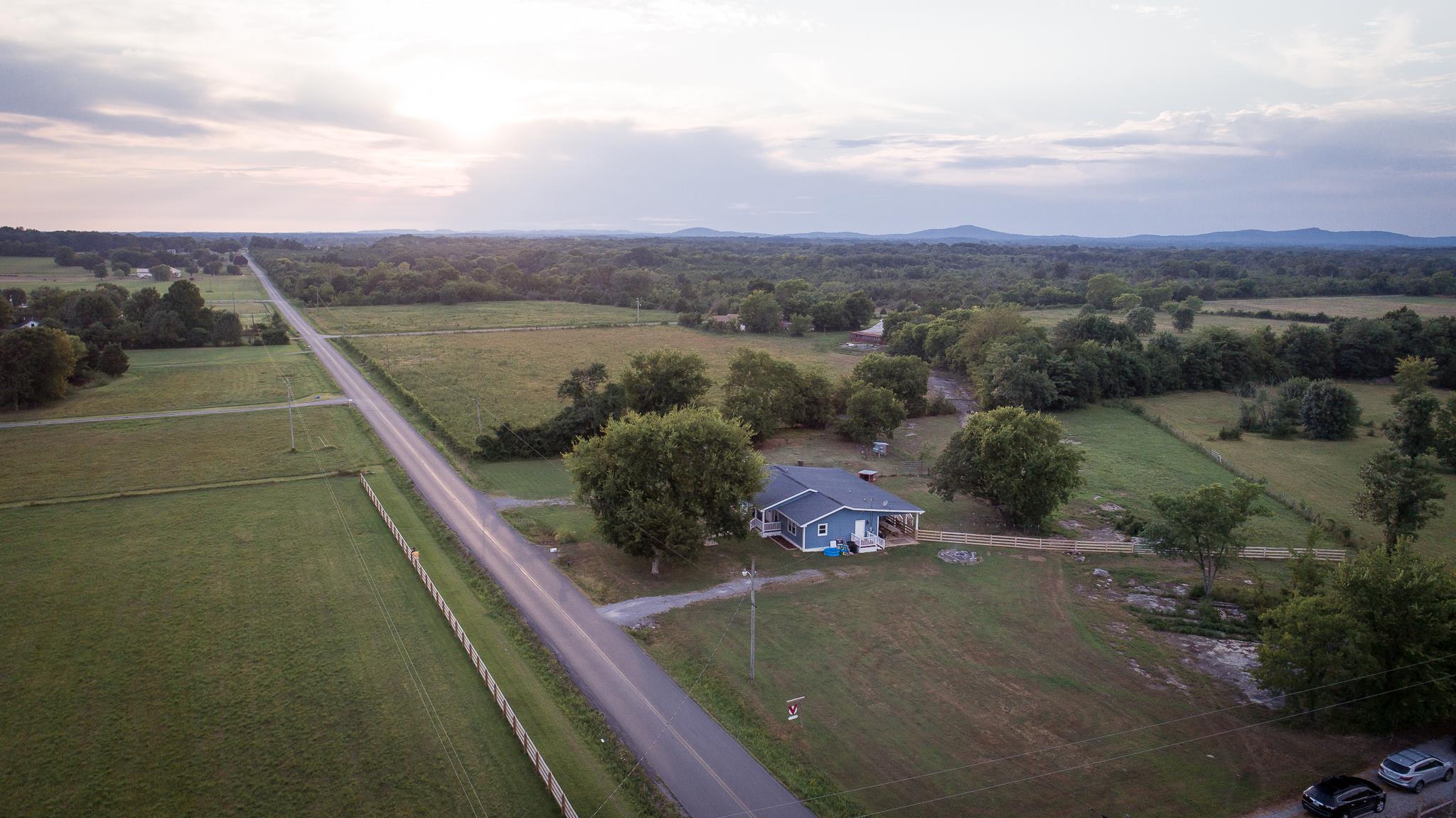 420 Squire Hall Road Bell Buckle, TN 37020 - Photo 22 of 23 a view of a lake from a balcony