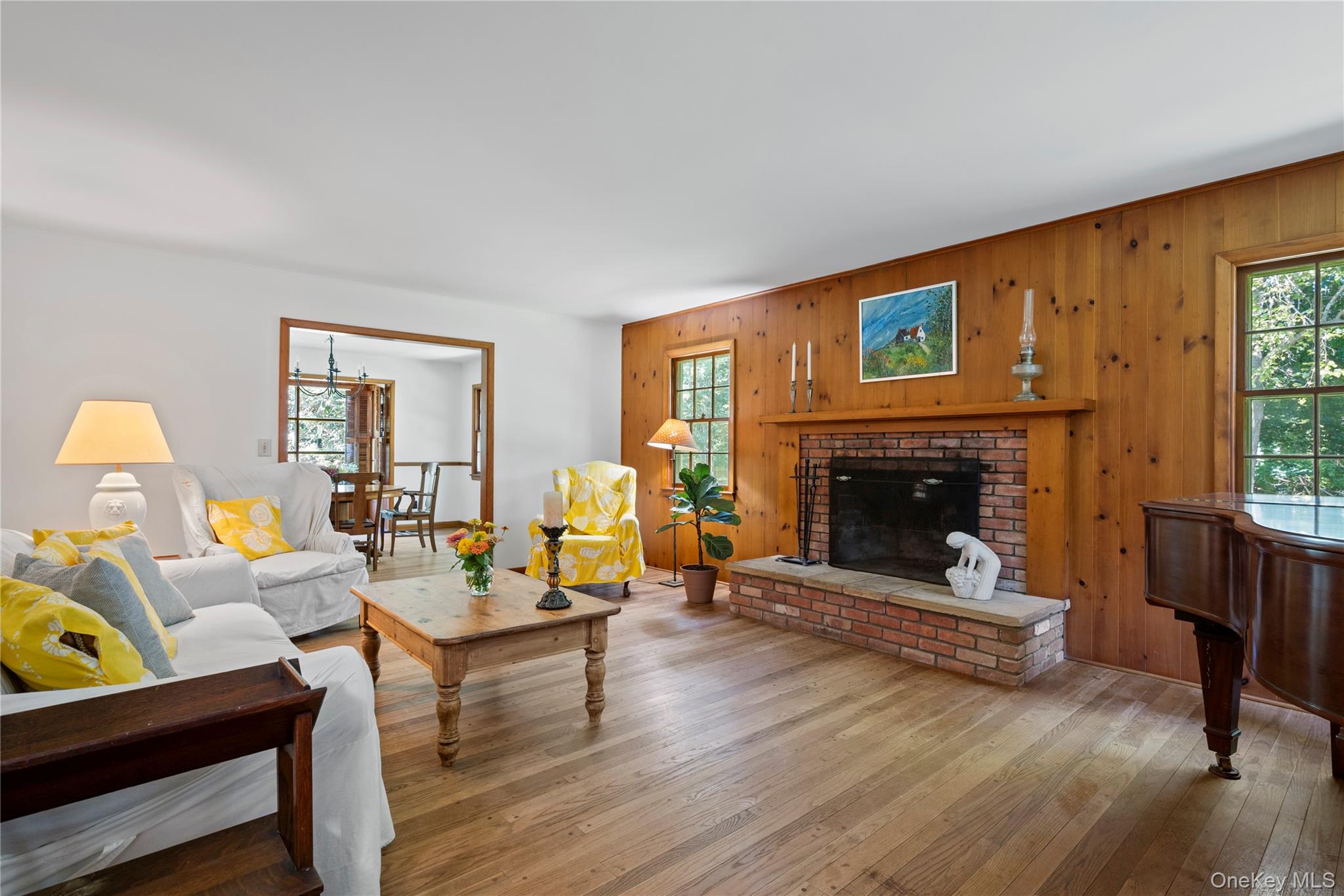 26 South Menantic Road Shelter Island, NY 11964 - Photo 13 of 49 a living room with furniture and a fireplace