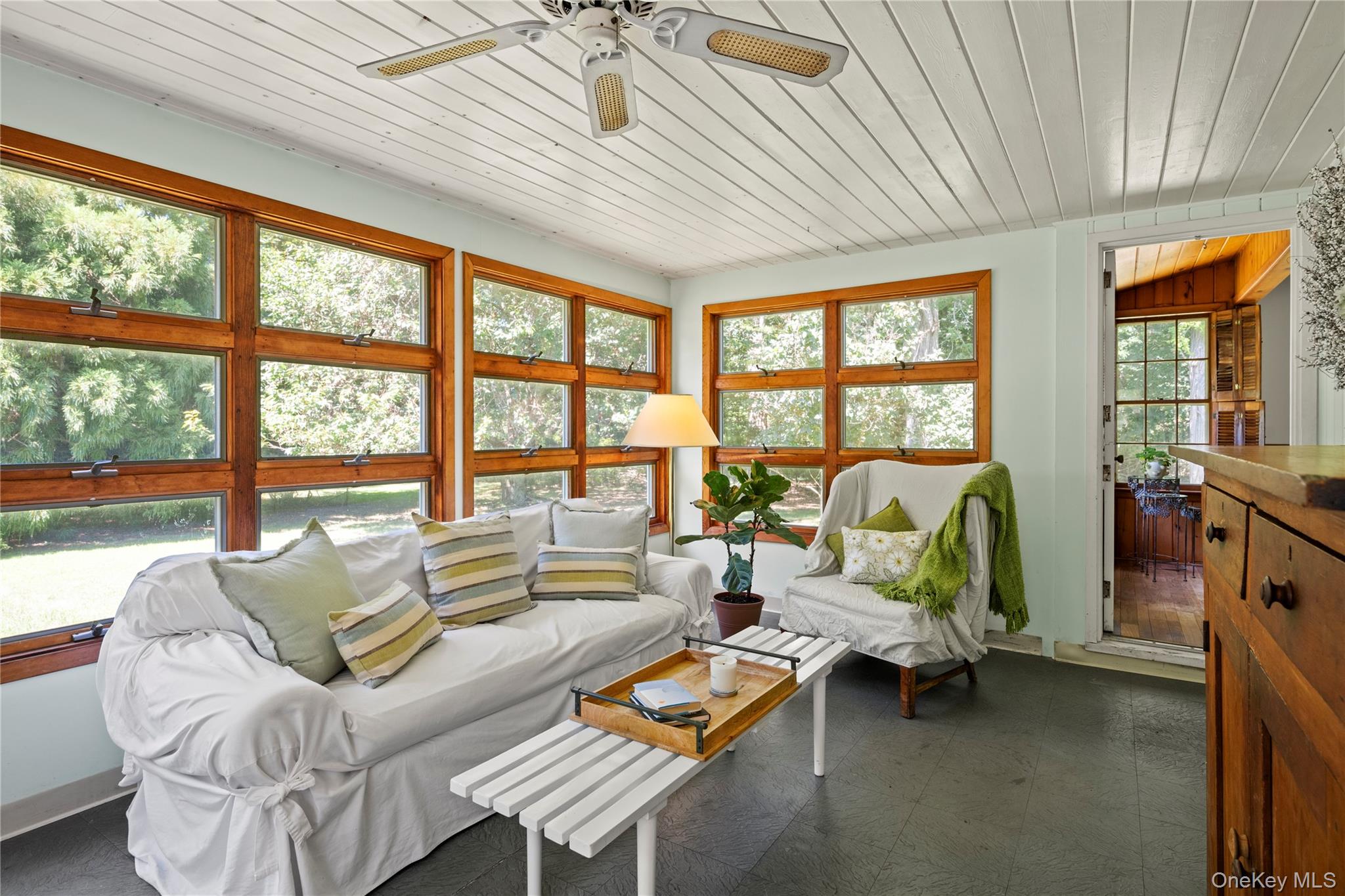 26 South Menantic Road Shelter Island, NY 11964 - Photo 18 of 42 a living room with furniture and a large window