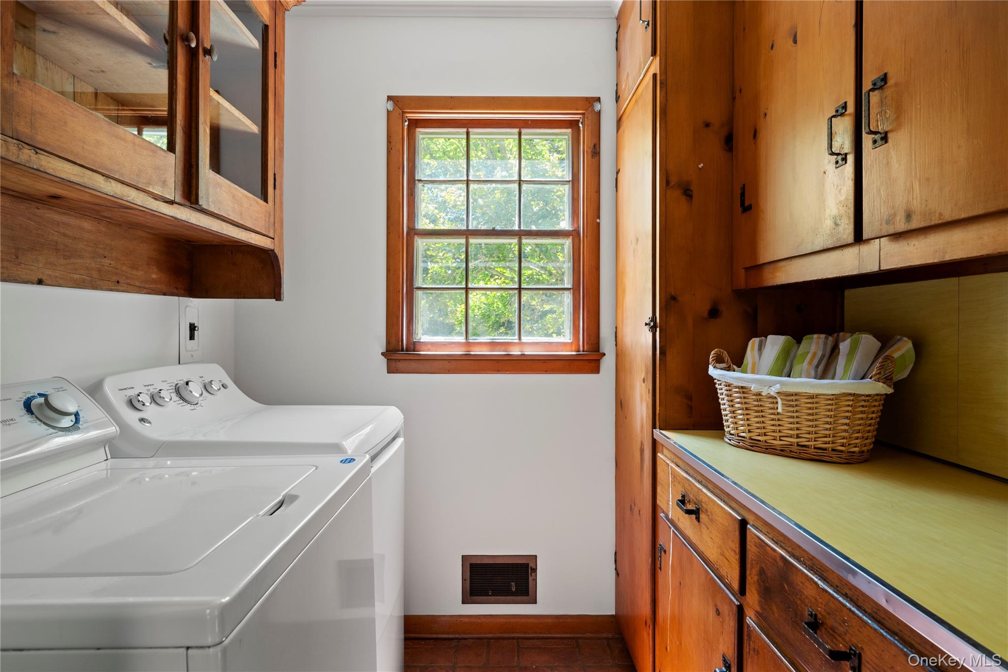 26 South Menantic Road Shelter Island, NY 11964 - Photo 21 of 49 a kitchen with a sink and cabinets