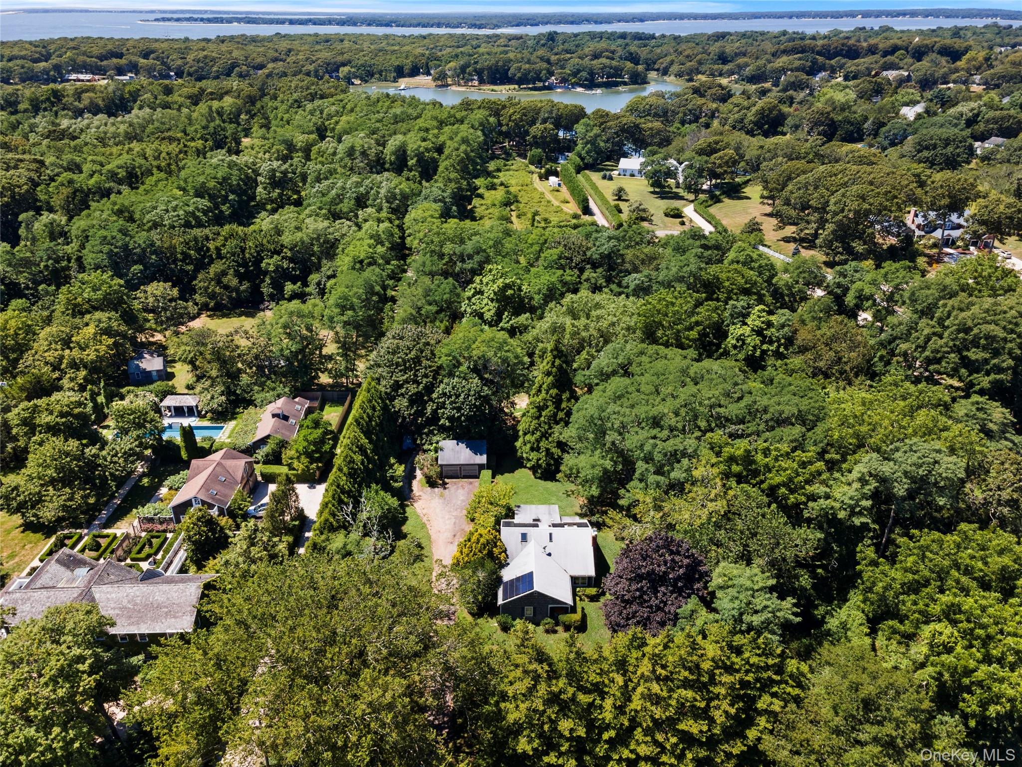 26 South Menantic Road Shelter Island, NY 11964 - Photo 41 of 49 an aerial view of a house with a yard
