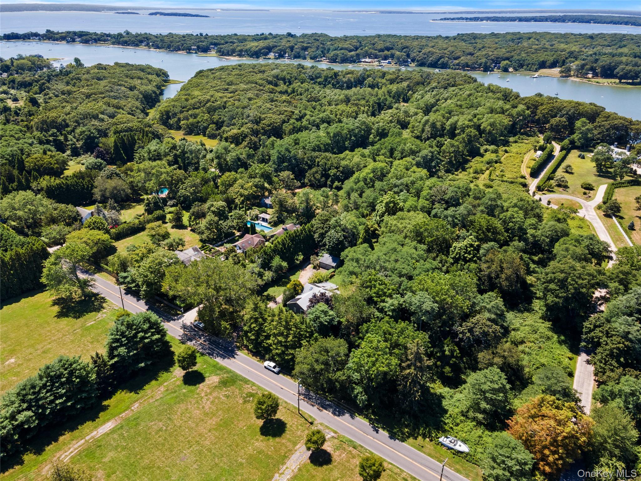 26 South Menantic Road Shelter Island, NY 11964 - Photo 43 of 49 an aerial view of residential houses with outdoor space