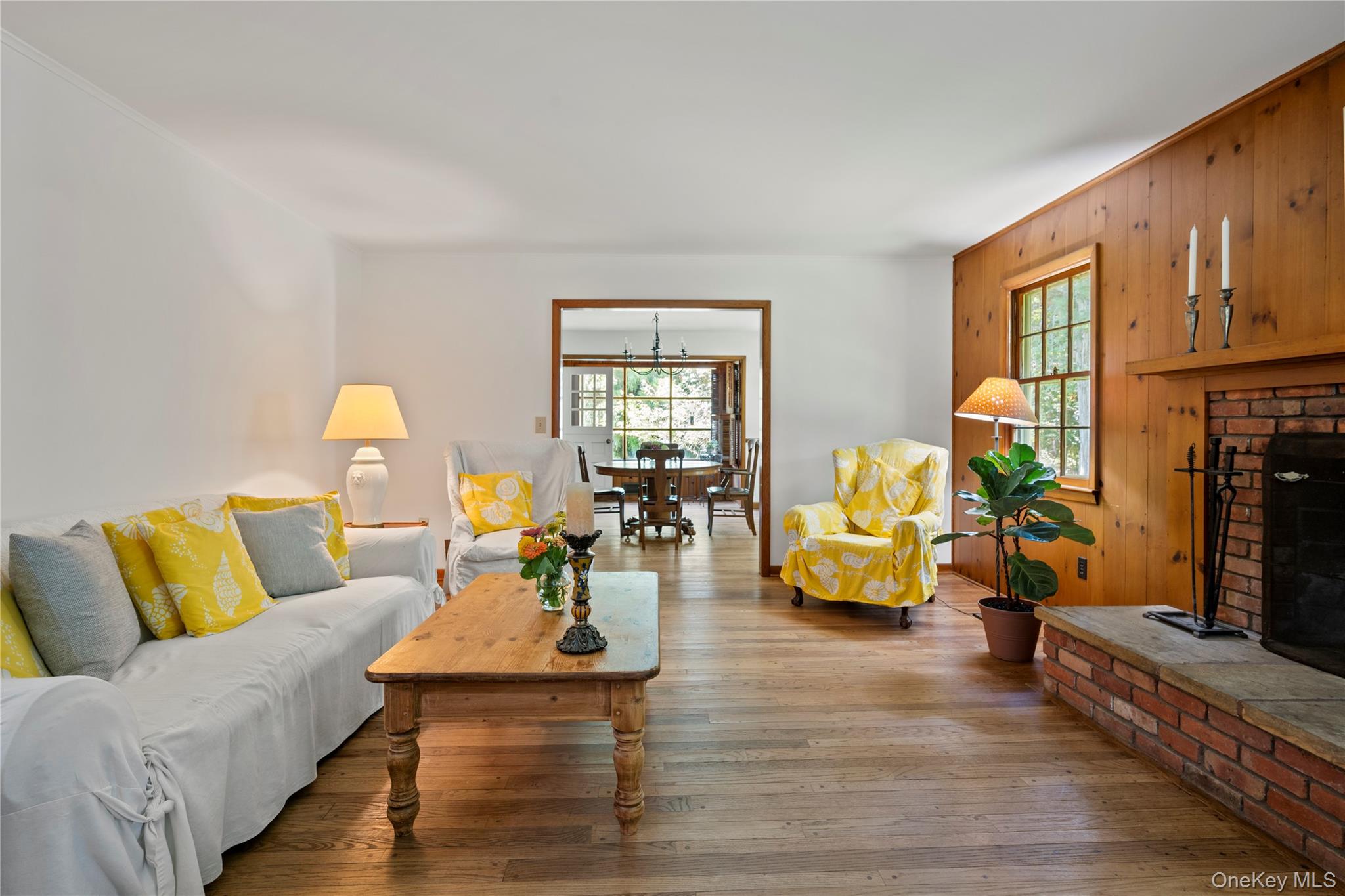 26 South Menantic Road Shelter Island, NY 11964 - Photo 8 of 42 a living room with furniture and a flat screen tv