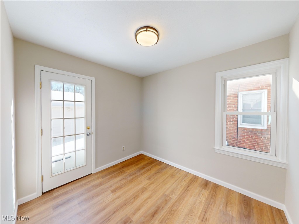 1343 Irene Road Lyndhurst, OH 44124 - Photo 7 of 32 Empty room featuring light hardwood / wood-style flooring
