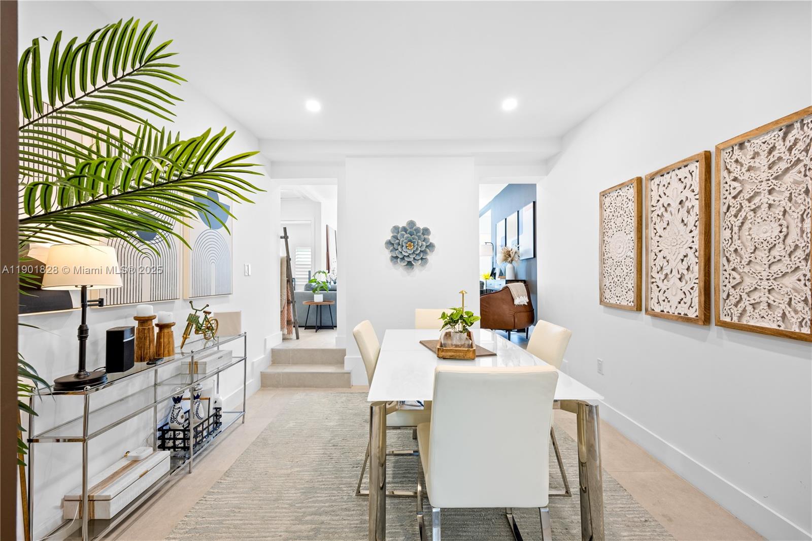 11 Northwest 45th Street Miami, FL 33127 - Photo 8 of 28 a dining room with furniture and a potted plant