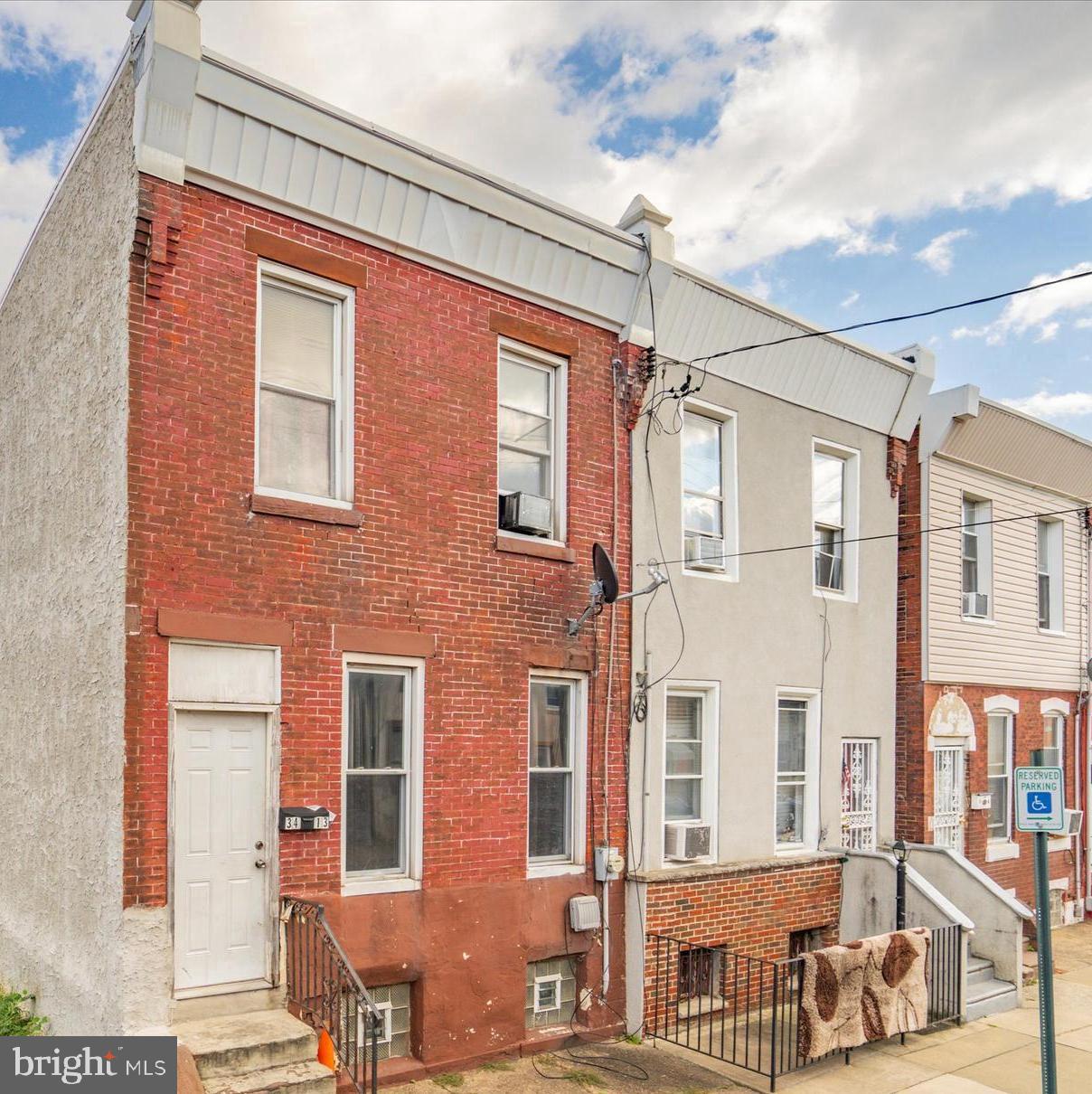 3413 North 10th Street Philadelphia, PA 19140 - Photo 1 of 2 a front view of a building with many windows