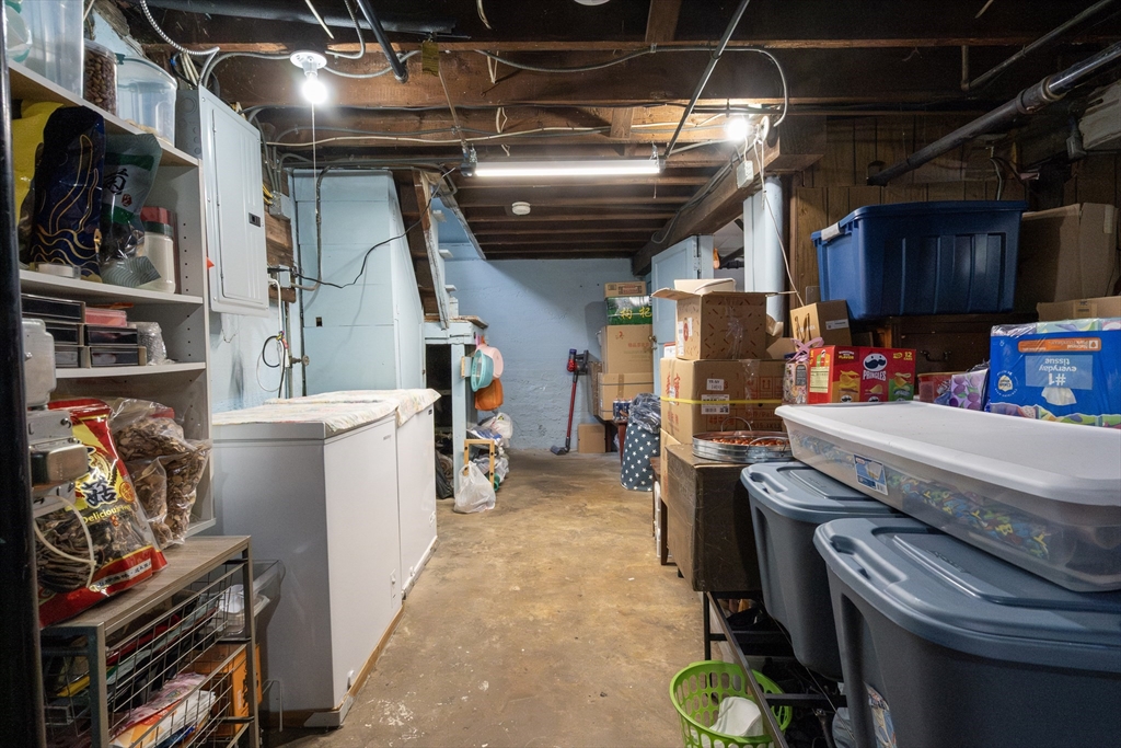45 North Crescent Circle Sudbury, MA 01776 - Photo 15 of 16 a utility room with dryer washer and stair
