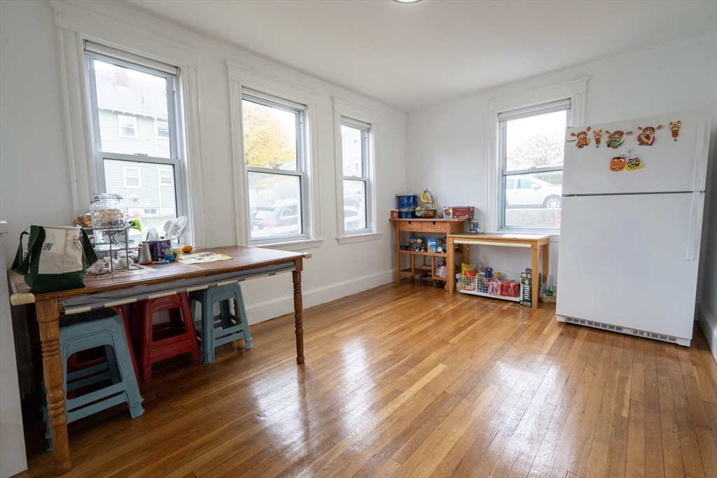 45 North Crescent Circle Sudbury, MA 01776 - Photo 3 of 16 a view of a workspace with furniture and wooden floor