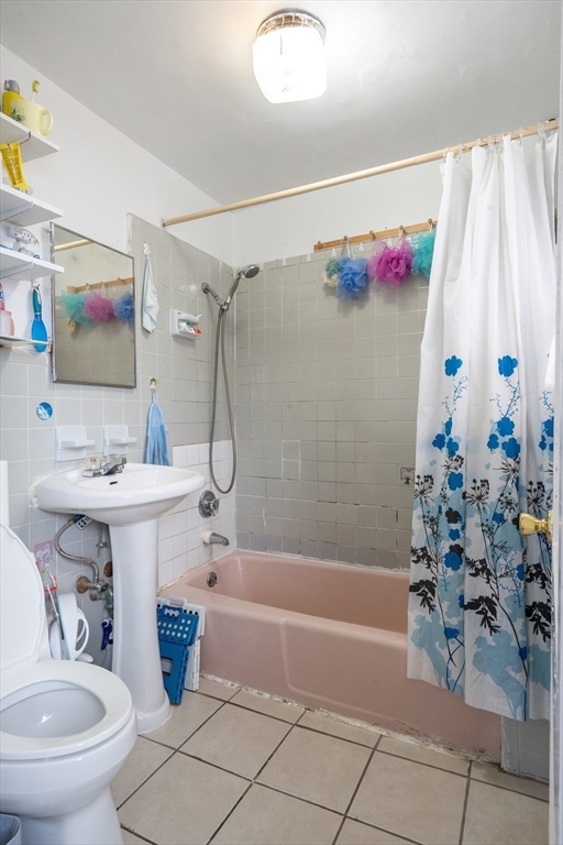 45 North Crescent Circle Sudbury, MA 01776 - Photo 8 of 16 a bathroom with a sink a bath tub and a shower