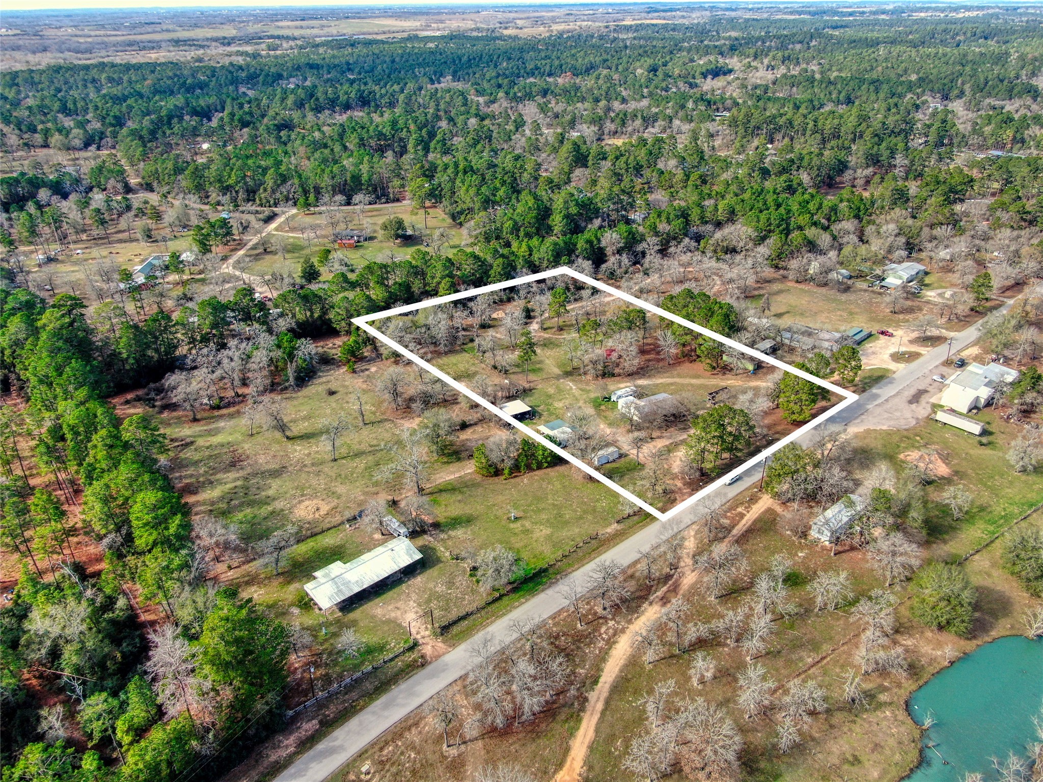 15701 County Road 304 Navasota, TX 77868 - Photo 7 of 9 a view of a tennis court