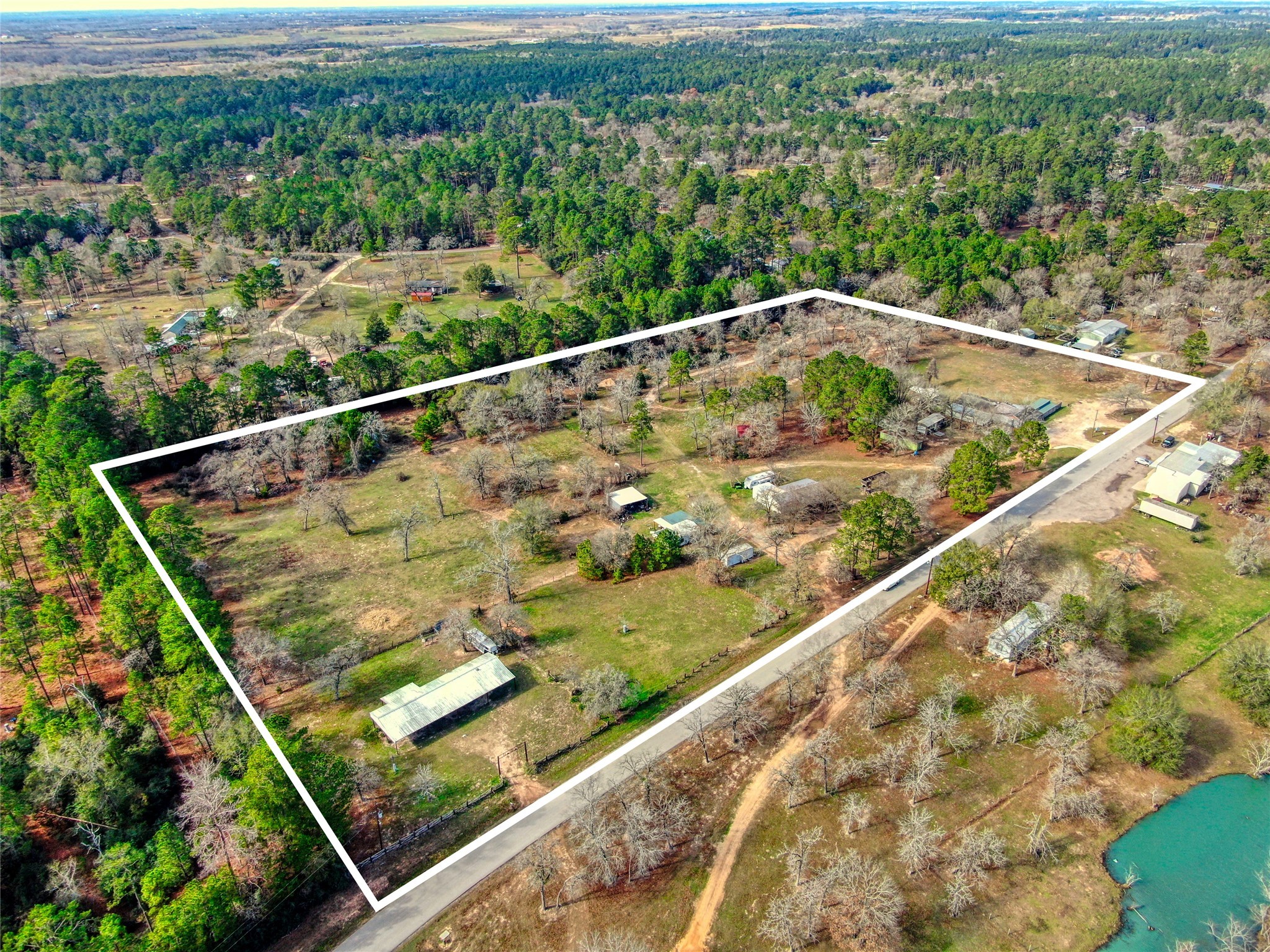 15701 County Road 304 Navasota, TX 77868 - Photo 8 of 9 a view of a green field with sitting area