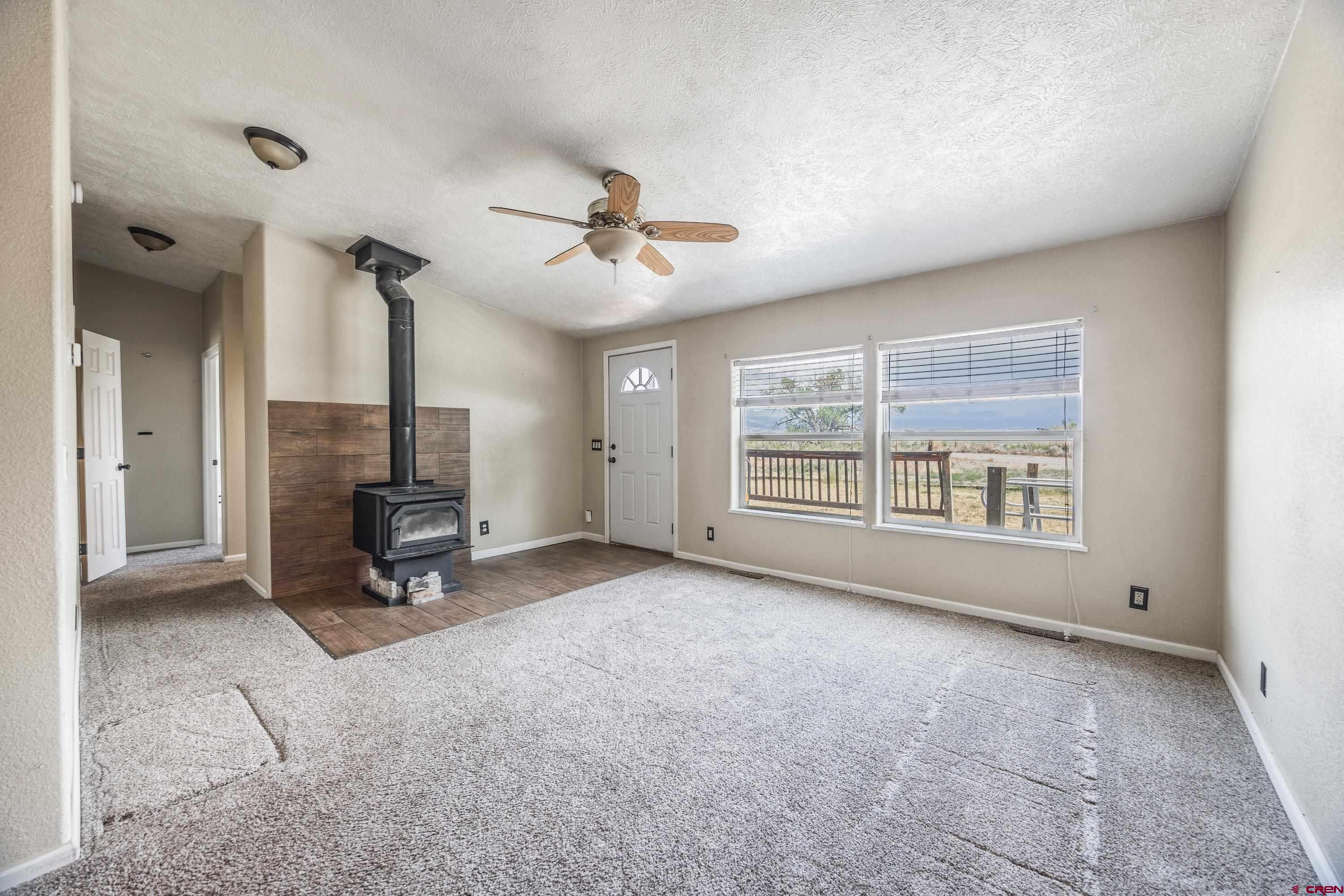 17377 Breeze Road Delta, CO 81416 - Photo 14 of 45 a view of workspace with furniture and windows