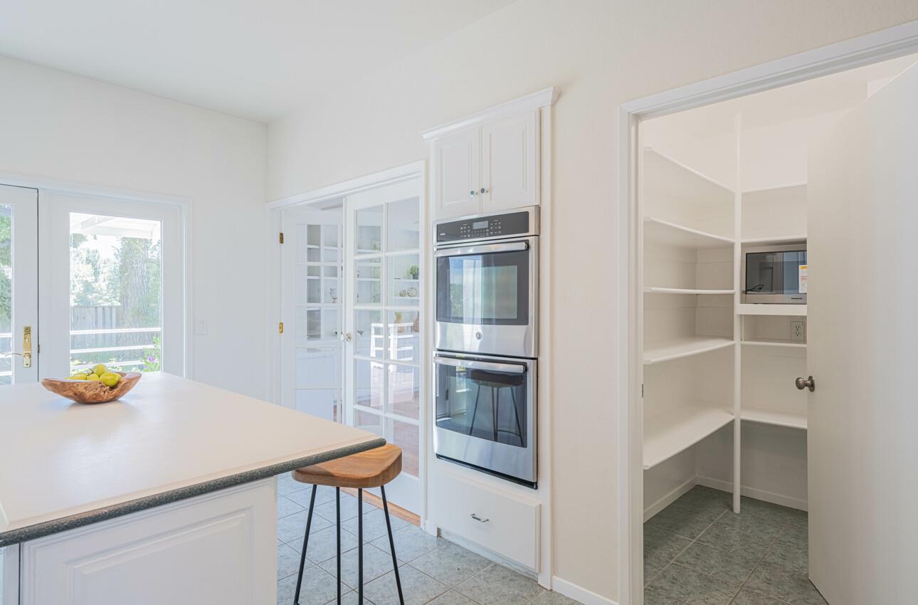 175 Tamarack Drive Aptos, CA 95003 - Photo 16 of 54 a kitchen with a refrigerator and a stove top oven