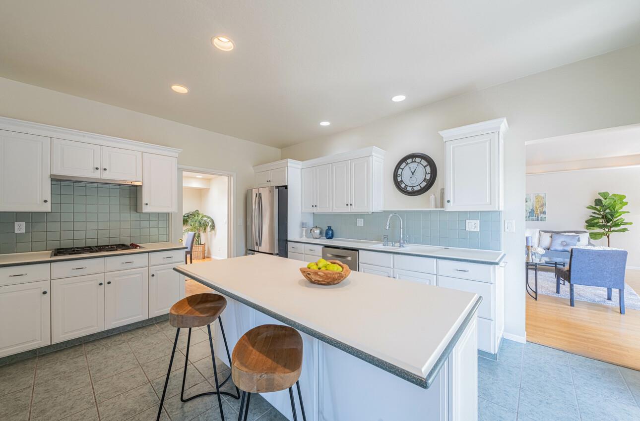 175 Tamarack Drive Aptos, CA 95003 - Photo 17 of 54 a kitchen with a dining table and chairs