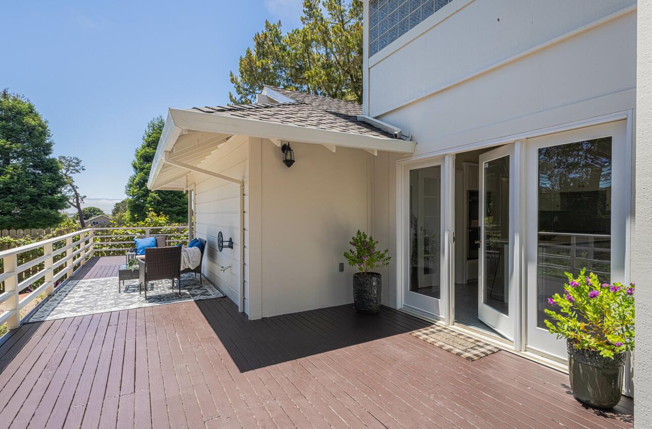 175 Tamarack Drive Aptos, CA 95003 - Photo 25 of 54 a view of a balcony with chairs and wooden floor