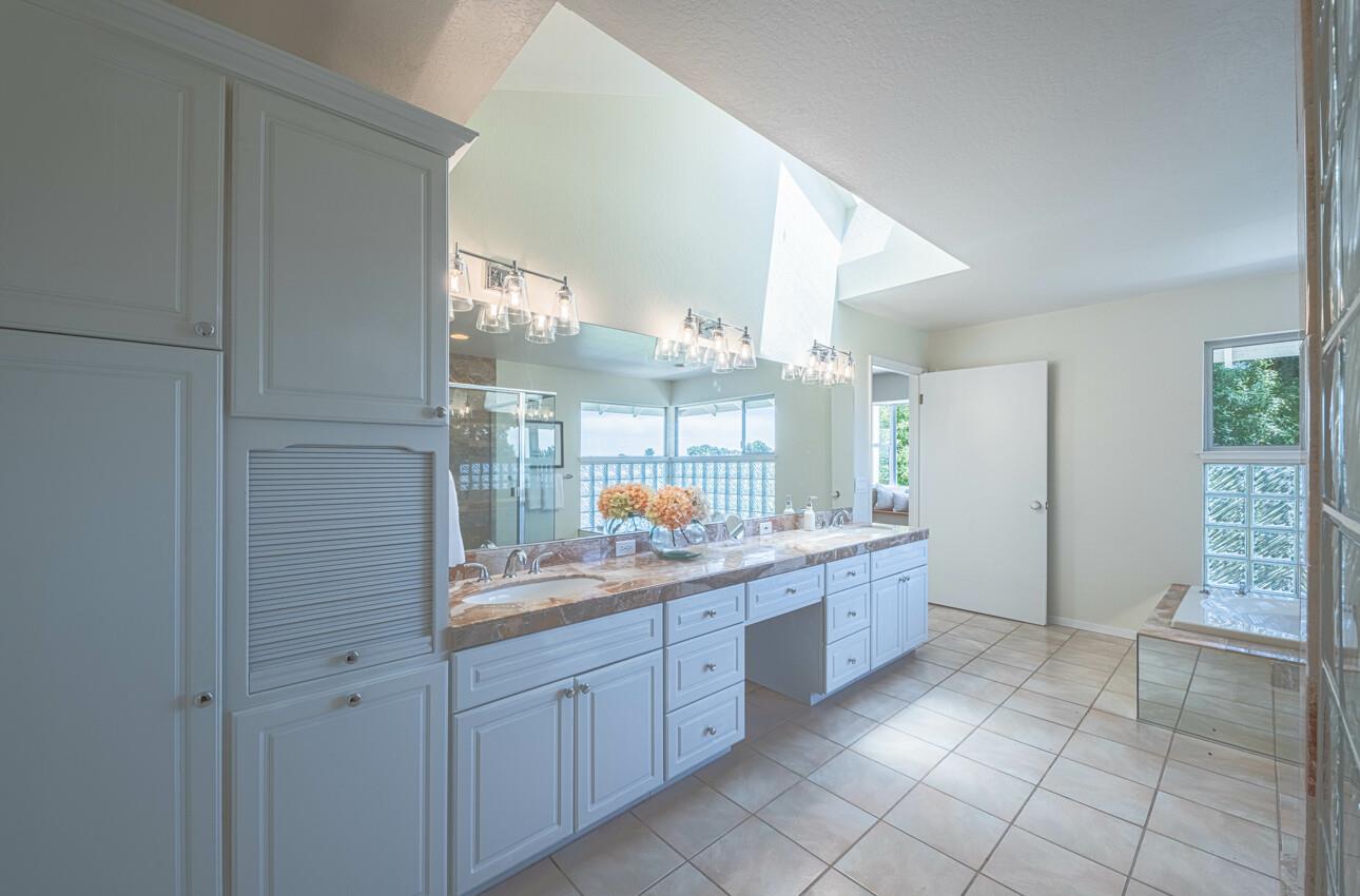 175 Tamarack Drive Aptos, CA 95003 - Photo 42 of 54 a large bathroom with a double vanity sink and a mirror