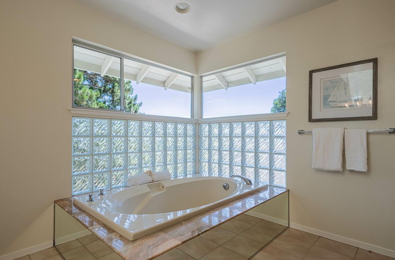 175 Tamarack Drive Aptos, CA 95003 - Photo 43 of 54 a bath tub sitting next to a window