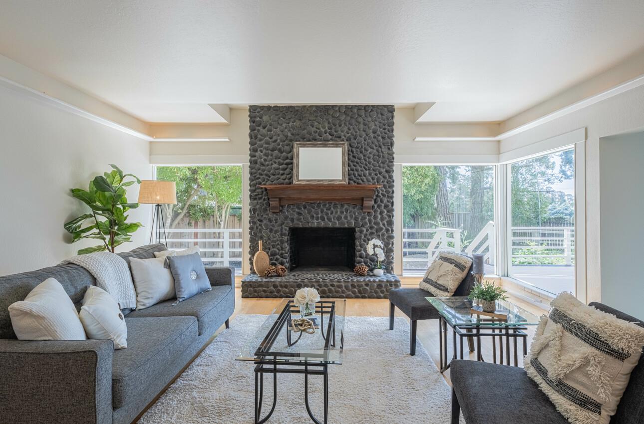 175 Tamarack Drive Aptos, CA 95003 - Photo 7 of 54 a living room with furniture and a fireplace