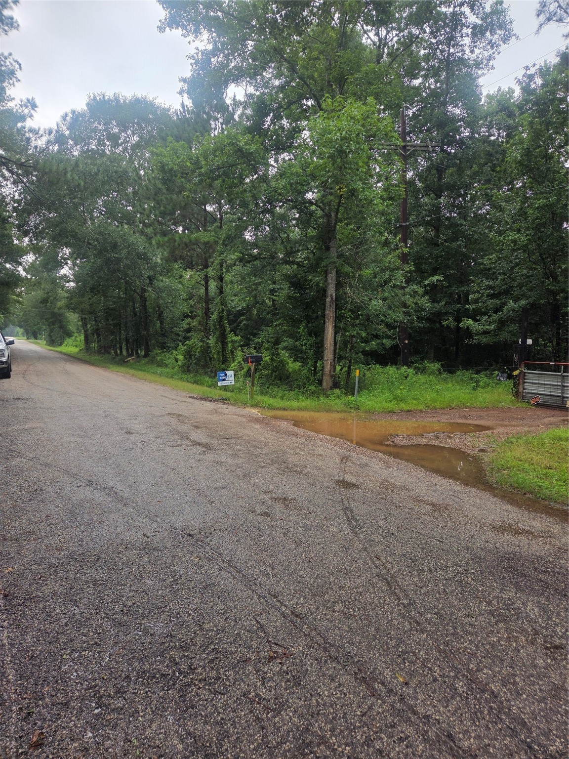 0 Magnolia Lane North Splendora, TX 77372 - Photo 10 of 10 a view of a field with trees in the background