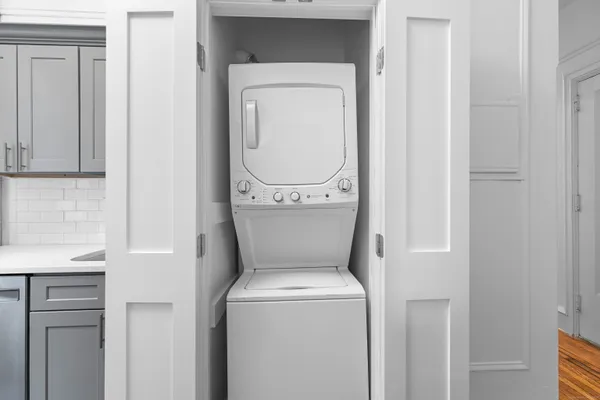 a utility room with dryer and washer