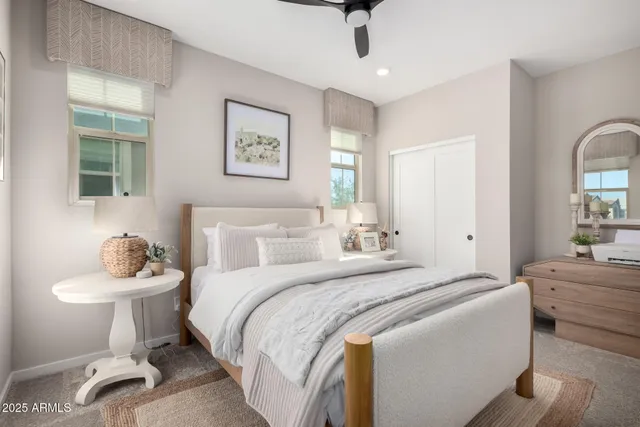 a bedroom with a bed and a table