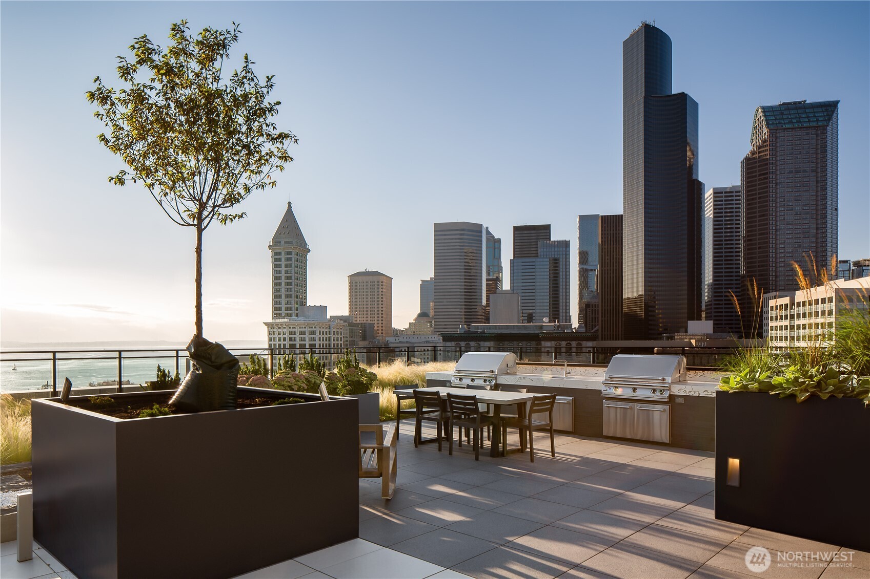 450 South Main Street, Unit 1006 Seattle, WA 98104 - Photo 21 of 23 a living room with couches and pool view