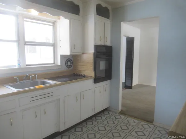 a bathroom with a sink and a bathtub