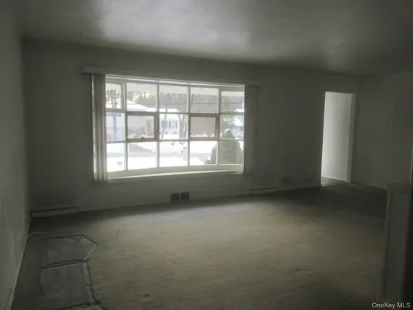 an empty room with a window