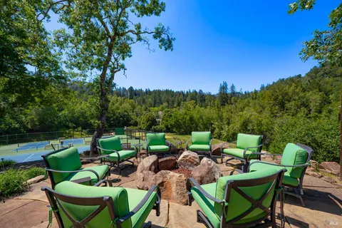 a view of a yard with an outdoor space