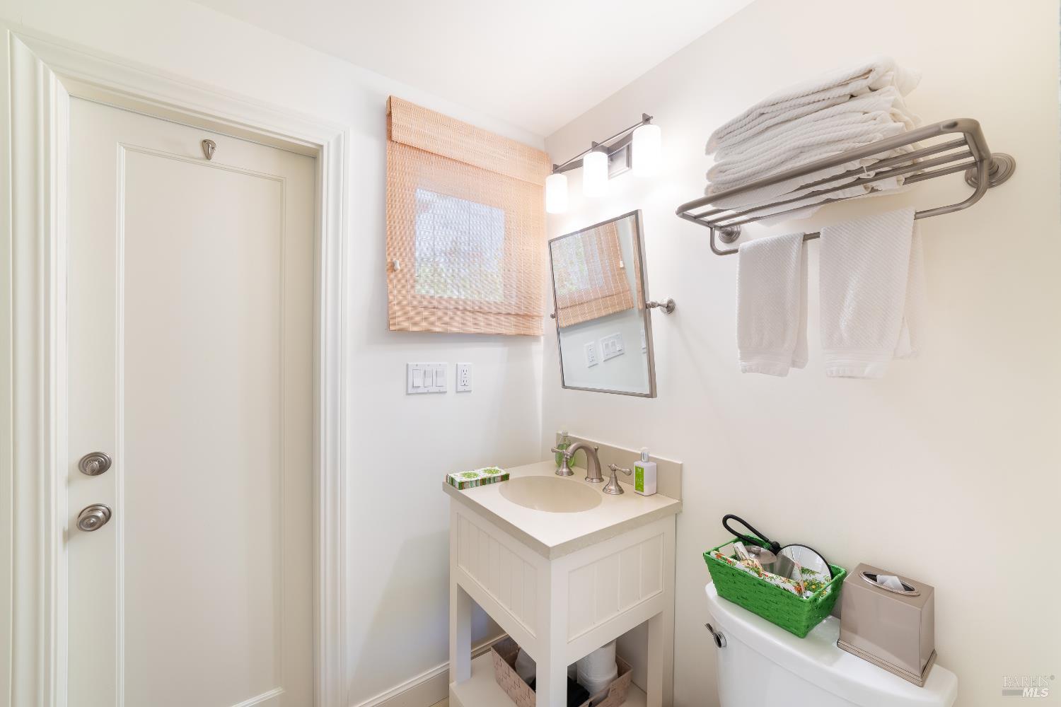 4500 Redwood Road Napa, CA 94558 - Photo 41 of 86 a bathroom with a sink a mirror and shower