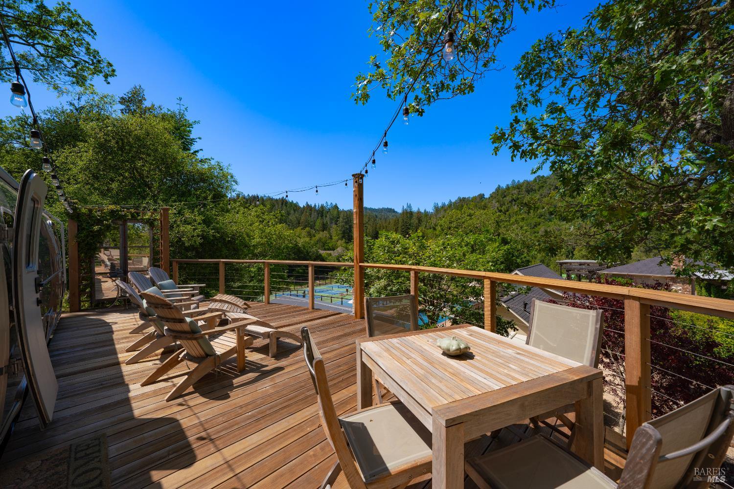 4500 Redwood Road Napa, CA 94558 - Photo 69 of 86 a view of a roof deck with wooden floor and seating space