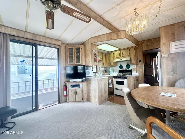 a kitchen with a stove and a sink