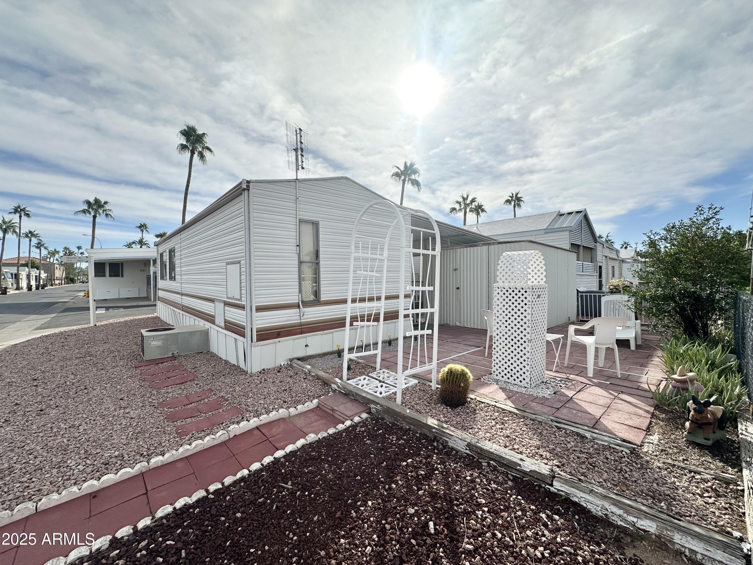 3710 South Goldfield Road, Unit 1052 Apache Junction, AZ 85119 - Photo 2 of 48 WOW! HUGE CORNER LOT