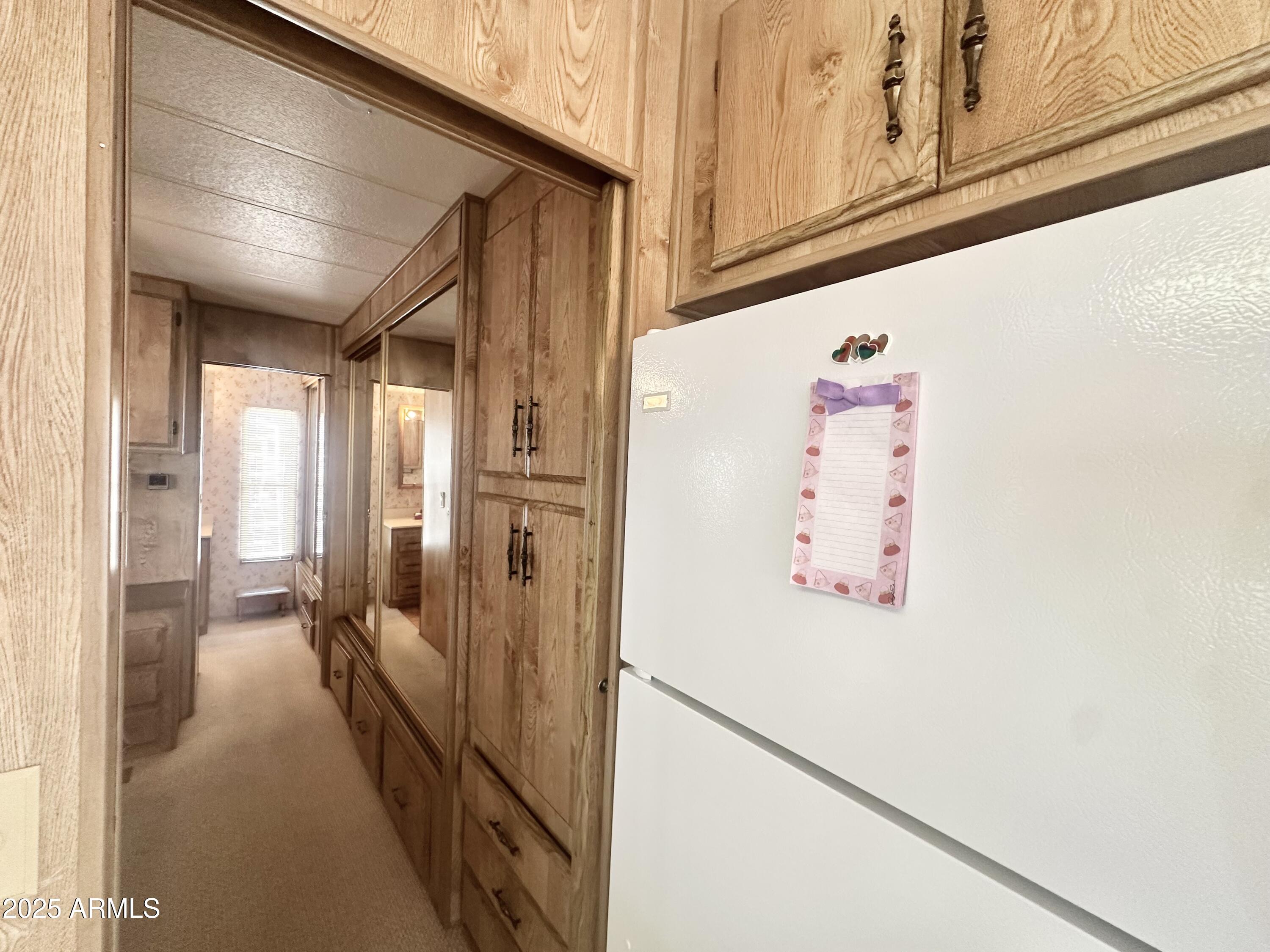 3710 South Goldfield Road, Unit 1052 Apache Junction, AZ 85119 - Photo 21 of 48 a view of hallway with stairs