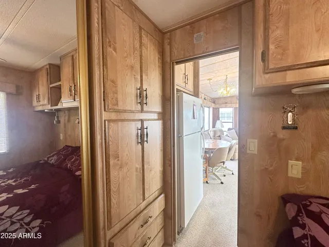 a view of a porch with wooden floor