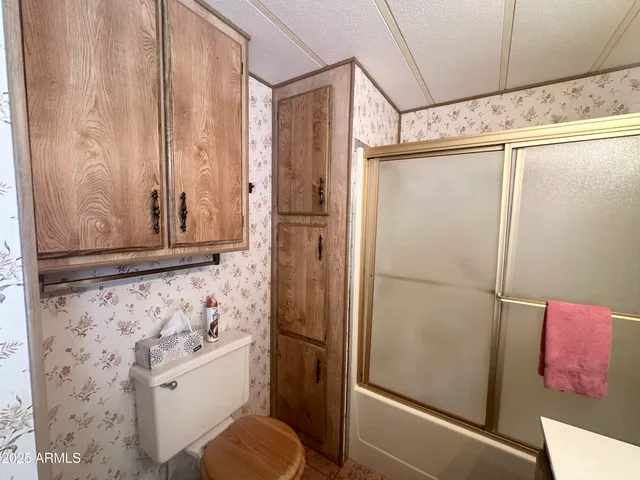 a view of swimming pool with outdoor seating