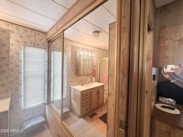 a view of a swimming pool with outdoor seating