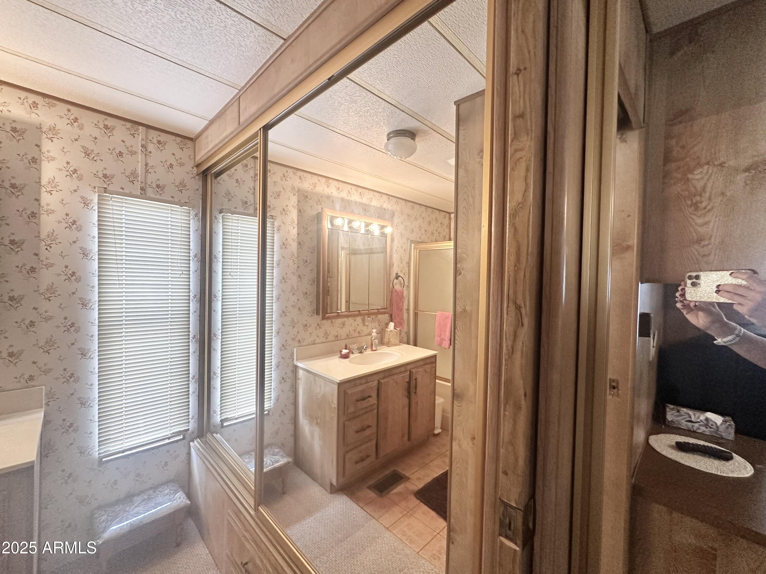 3710 South Goldfield Road, Unit 1052 Apache Junction, AZ 85119 - Photo 32 of 48 MIRRORED CLOSET IN BEDROOM