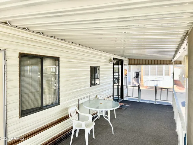 a view of a building with a porch
