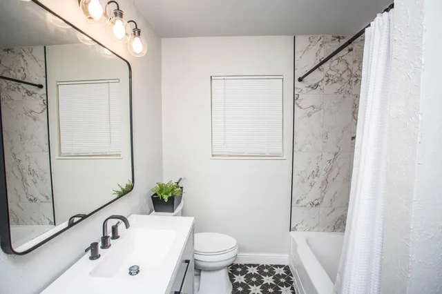 a bathroom with a sink and a tub